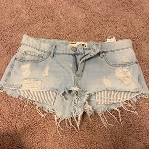 blue ripped jean shorts. size 3